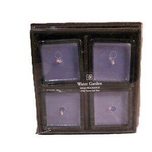 4-piece votive candles with simulated leather case